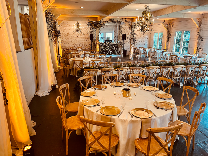 Amber Uplights all around The Wildflower Barn for a wedding in Milton GA